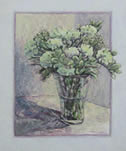 Green Flowers in Clear Vase